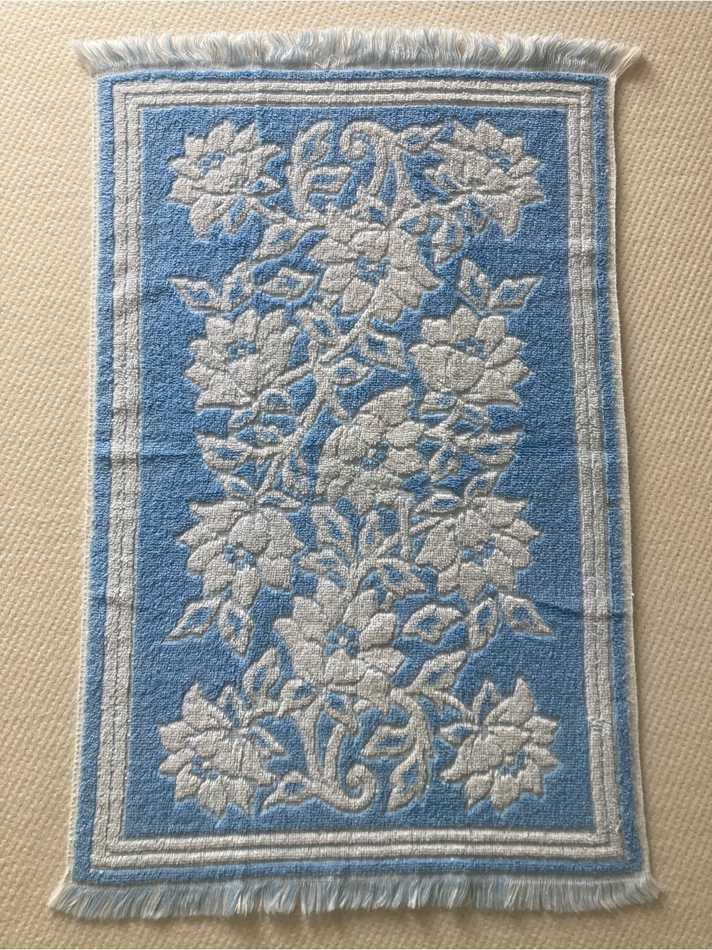 Blue and white vintage Fieldcrest towel with fringe